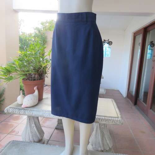 Vintage navy polycotton pencil skirt size 38/14. Perfect fit! Zip and slit at back. 2 button closure