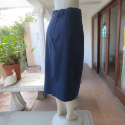 Vintage navy polycotton pencil skirt size 38/14. Perfect fit! Zip and slit at back. 2 button closure