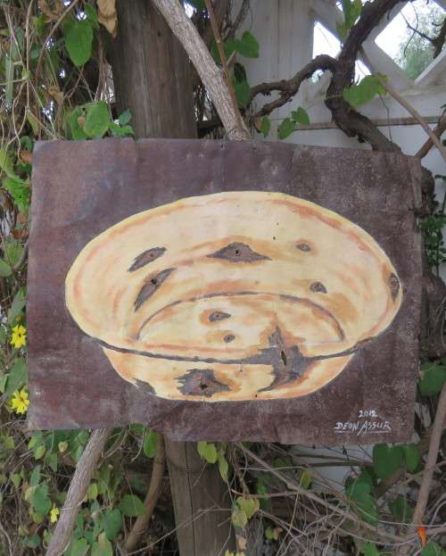 Unique decorative junk art by artist DEON ASSUR 2012 of bowl on rusted metal. Size 40cm x 30cm.