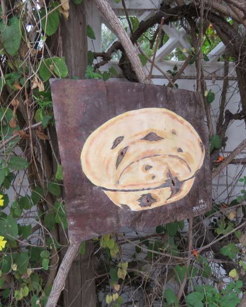 Unique decorative junk art by artist DEON ASSUR 2012 of bowl on rusted metal. Size 40cm x 30cm.