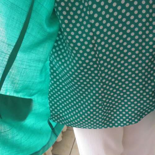 Amazing emerald green short sleeve jacket with polkadot attached waistcoat.Size 44/20.Brand new cond