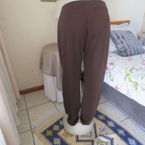 Choc brown dress pants by TOPICS in perfect fit 36/12. Straight legs. Very tiny front dummies.As new