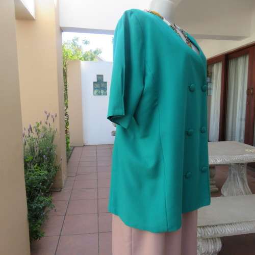 Smart double breast jade colour short sleeve boutique made V front jacket. Size 42/18. New cond.
