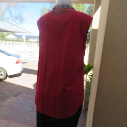 Fiery red sleeveless button down top with mandarin collar by WOOLWORTHS size 38/14. Viscose/cotton.