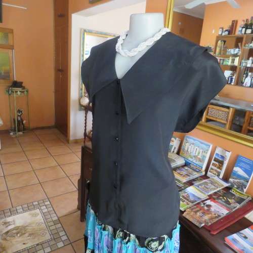 Lovely black silky polyester button down top. Tiny cut-on sleeves. Wide pointed collar. Size 40/16.