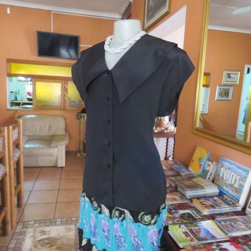 Lovely black silky polyester button down top. Tiny cut-on sleeves. Wide pointed collar. Size 40/16.