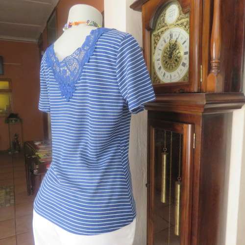 Casual navy/white horizontal striped capped sleeve top size 36/12. Lace decoration at back. As new