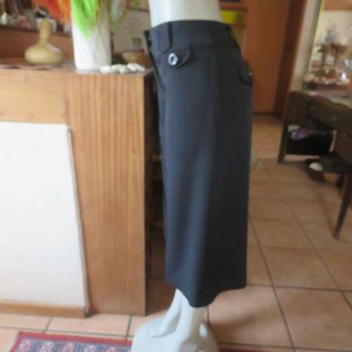 As new black stretch polyester culotte pants size 36/12 by CONNECTION. Dummy pockets. Belt loops