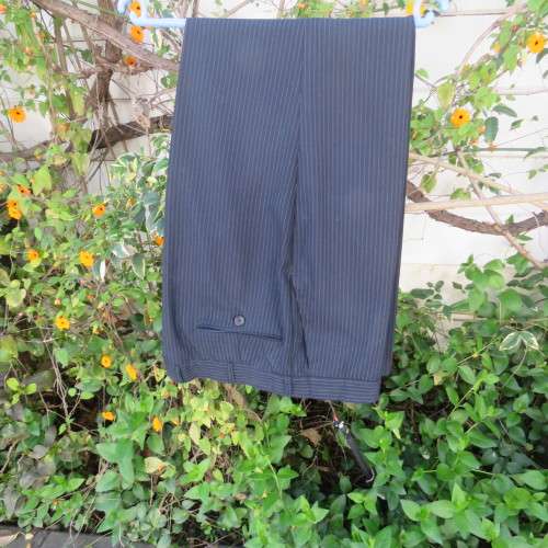 Men`s very dark navy/thin grey stripes 2 pc trevira with 45% new wool suit. Jacket 42R. Pants 40.
