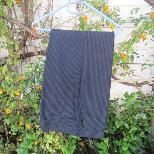 Men`s very dark navy/thin grey stripes 2 pc trevira with 45% new wool suit. Jacket 42R. Pants 40.
