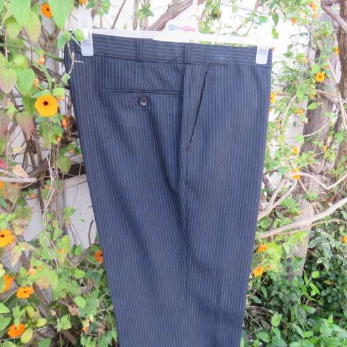 Men`s very dark navy/thin grey stripes 2 pc trevira with 45% new wool suit. Jacket 42R. Pants 40.