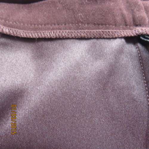 Elegant purple suede look pencil skirt just under knee length. Size 38/14. Zip at back. As new cond