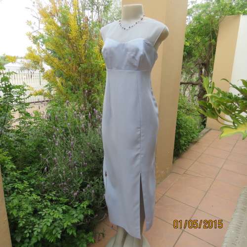 Beautiful long powder blue satin evening dress. With stunning back.Size 36. No label. As new cond.