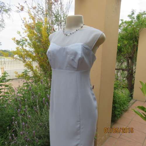 Beautiful long powder blue satin evening dress. With stunning back.Size 36. No label. As new cond.