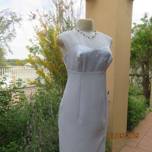 Beautiful long powder blue satin evening dress. With stunning back.Size 36. No label. As new cond.
