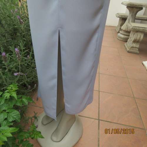 Beautiful long powder blue satin evening dress. With stunning back.Size 36. No label. As new cond.