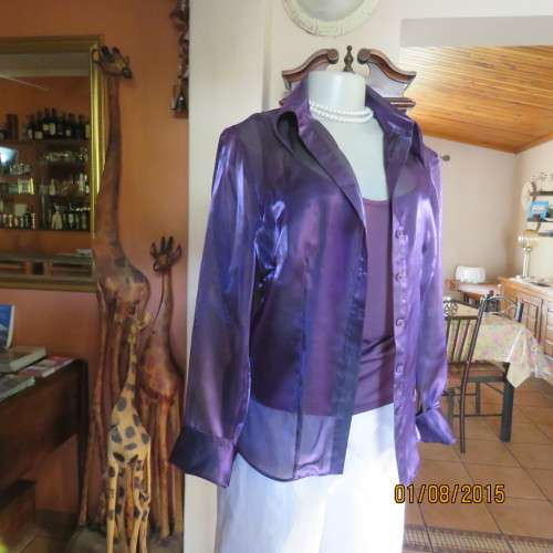 Glamorous shiny sheer purple long cuffed sleeve top.Tailored. By OASIS in size 36/12. Brand new cond