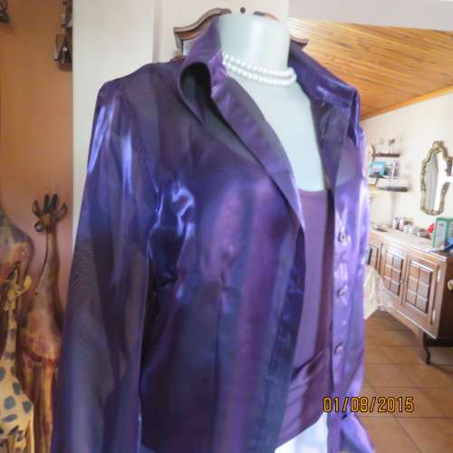 Glamorous shiny sheer purple long cuffed sleeve top.Tailored. By OASIS in size 36/12. Brand new cond