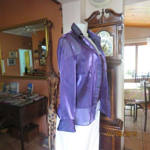 Glamorous shiny sheer purple long cuffed sleeve top.Tailored. By OASIS in size 36/12. Brand new cond