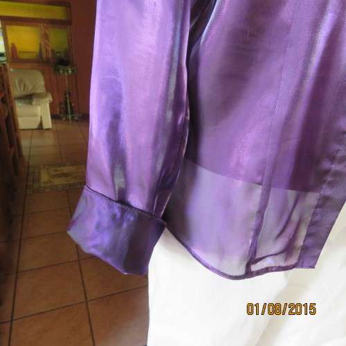 Glamorous shiny sheer purple long cuffed sleeve top.Tailored. By OASIS in size 36/12. Brand new cond