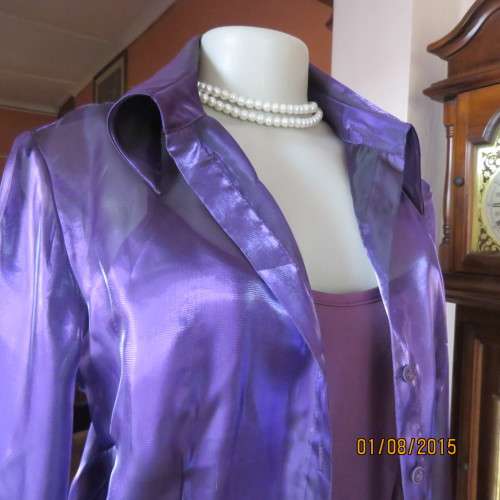 Glamorous shiny sheer purple long cuffed sleeve top.Tailored. By OASIS in size 36/12. Brand new cond