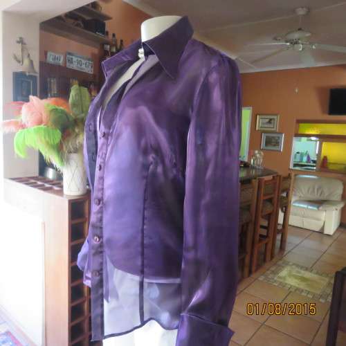 Glamorous shiny sheer purple long cuffed sleeve top.Tailored. By OASIS in size 36/12. Brand new cond