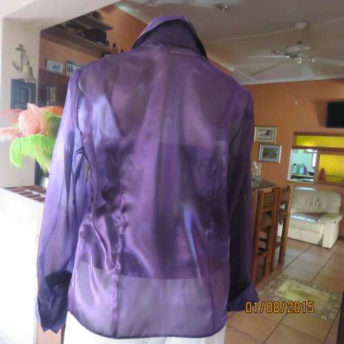 Glamorous shiny sheer purple long cuffed sleeve top.Tailored. By OASIS in size 36/12. Brand new cond