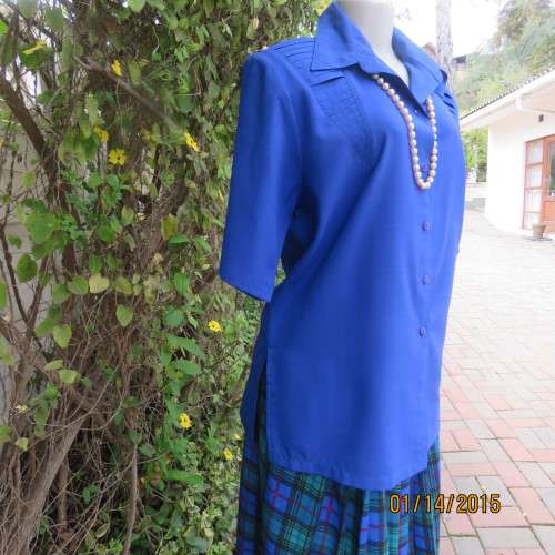 Make a statement with this royal blue uniquely styled polycotton top by B.S.TRADE size 42/18. As new
