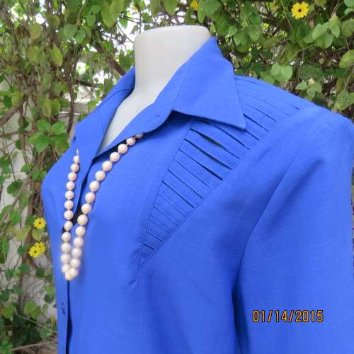 Make a statement with this royal blue uniquely styled polycotton top by B.S.TRADE size 42/18. As new