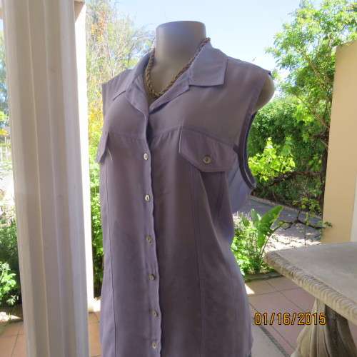 Sheer skyblue sleeveless top by TRUWORTHS size 42/18. Button down. Dummy pockets. As new.