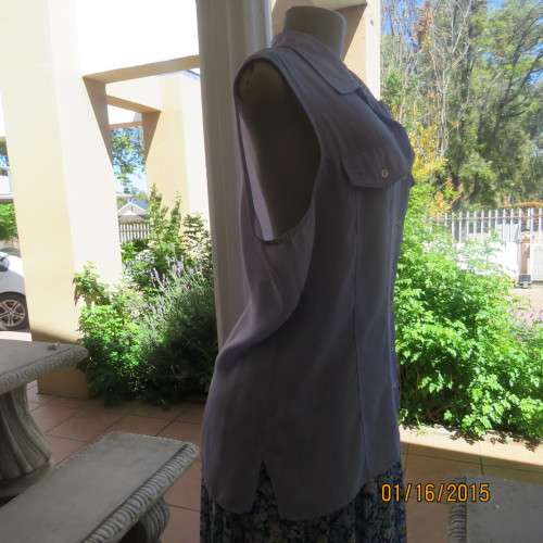 Sheer skyblue sleeveless top by TRUWORTHS size 42/18. Button down. Dummy pockets. As new.