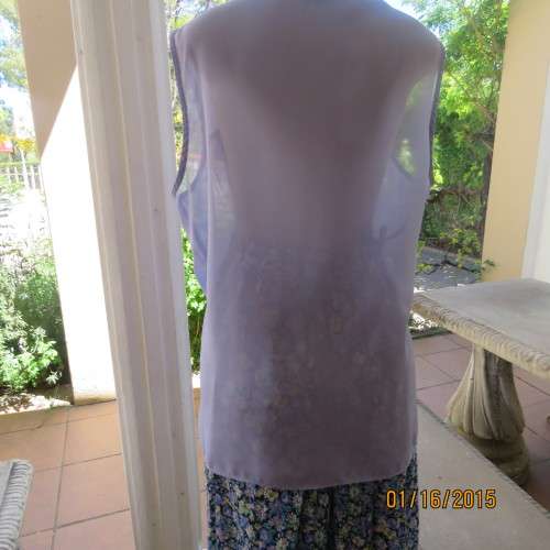 Sheer skyblue sleeveless top by TRUWORTHS size 42/18. Button down. Dummy pockets. As new.