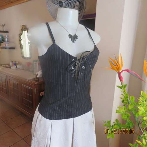Cheeky black pinstripe tailored strappy top in poly/viscose stretch.Braiding on front.By URB size 32