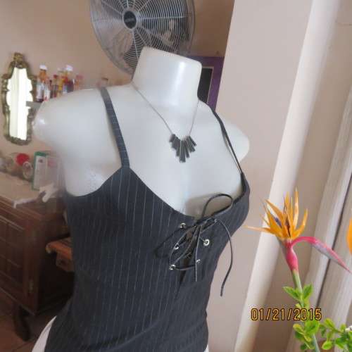 Cheeky black pinstripe tailored strappy top in poly/viscose stretch.Braiding on front.By URB size 32
