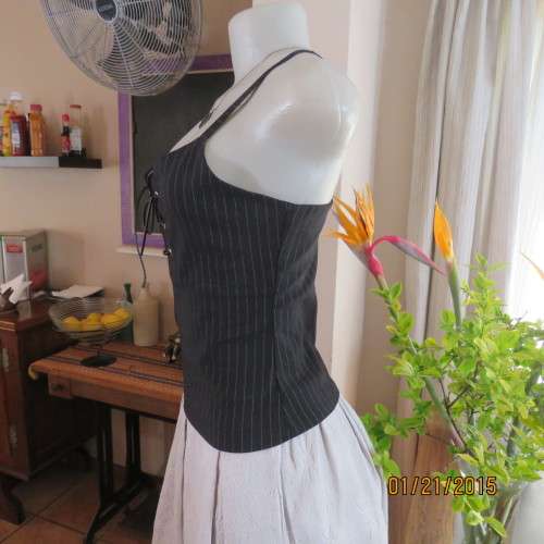 Cheeky black pinstripe tailored strappy top in poly/viscose stretch.Braiding on front.By URB size 32