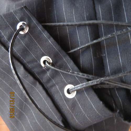 Cheeky black pinstripe tailored strappy top in poly/viscose stretch.Braiding on front.By URB size 32