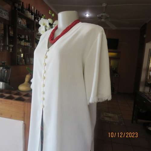 High quality light cream RAOUL size 40/16 long short sleeve top. Fringed hems. Partly button down.