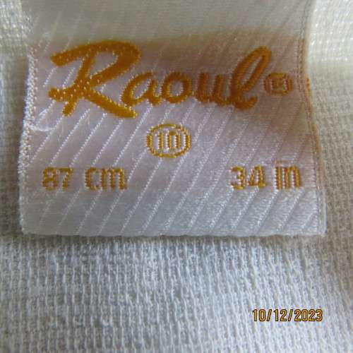 High quality light cream RAOUL size 40/16 long short sleeve top. Fringed hems. Partly button down.