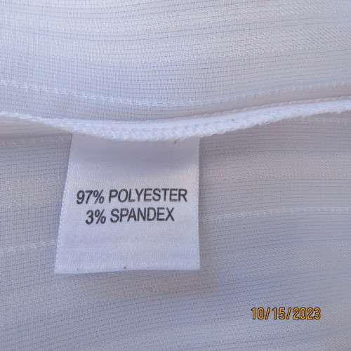 Smart white long sleeve polyester stretch top. Button down /open collar. Embossed stripes. Size 36.