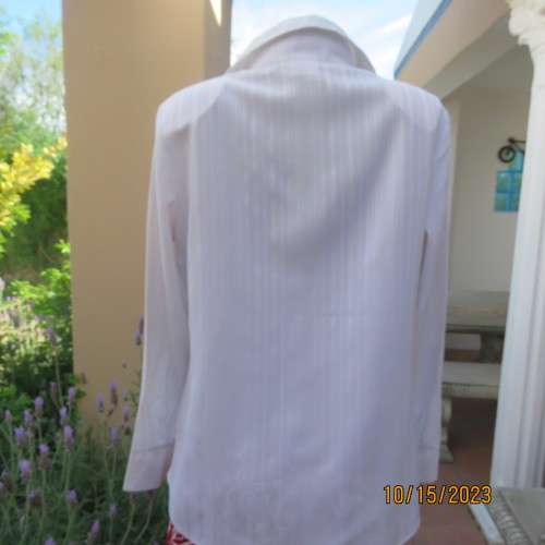 Smart white long sleeve polyester stretch top. Button down /open collar. Embossed stripes. Size 36.