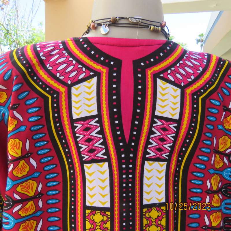 Ethnic slip over short cut-on sleeve top in maroon/stunning designs. Polycotton.Size 40 to 42.As new