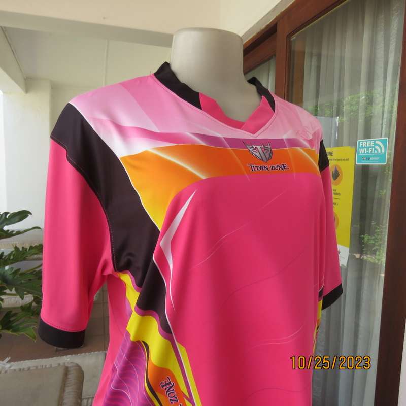 New TITAN ZONE sports slip over top in stretch polyester. Pink/yellow/black. Size 42/18. V neck.