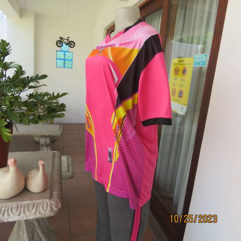 New TITAN ZONE sports slip over top in stretch polyester. Pink/yellow/black. Size 42/18. V neck.