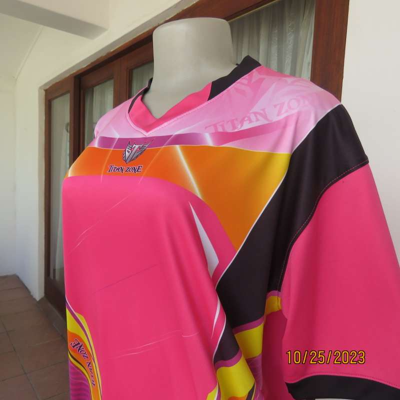 New TITAN ZONE sports slip over top in stretch polyester. Pink/yellow/black. Size 42/18. V neck.