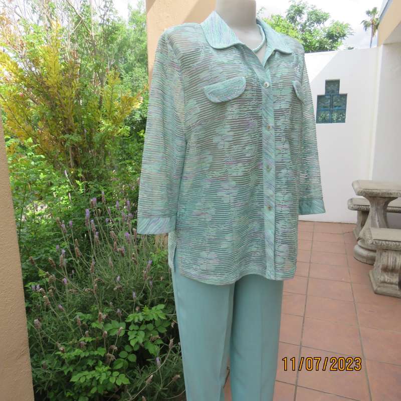 Amazing Agora fashion see-through jacket with embossed light turquois/ lilac pattern.Size 36/12.New