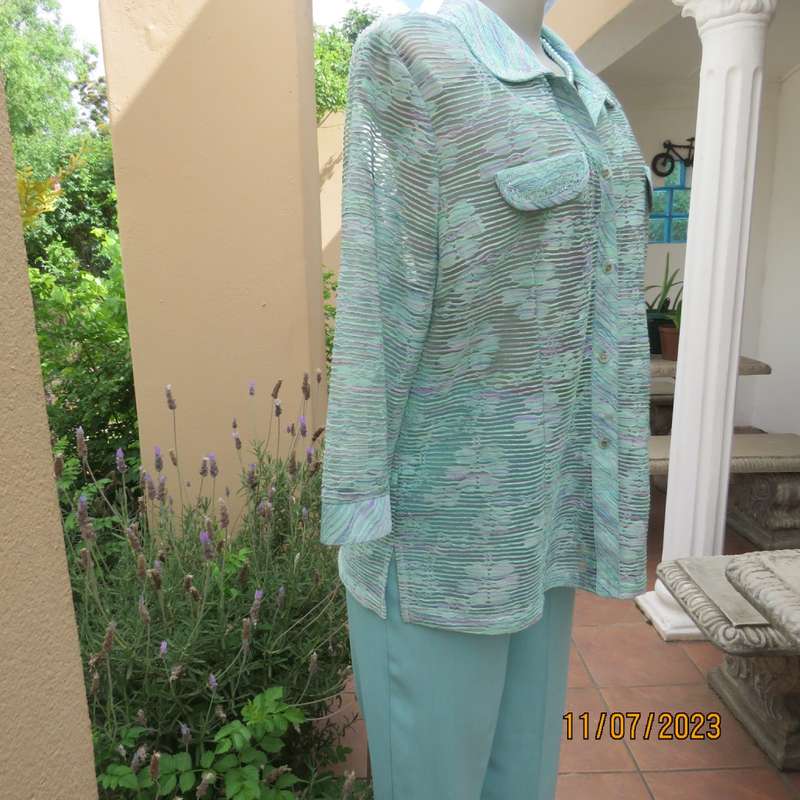Amazing Agora fashion see-through jacket with embossed light turquois/ lilac pattern.Size 36/12.New