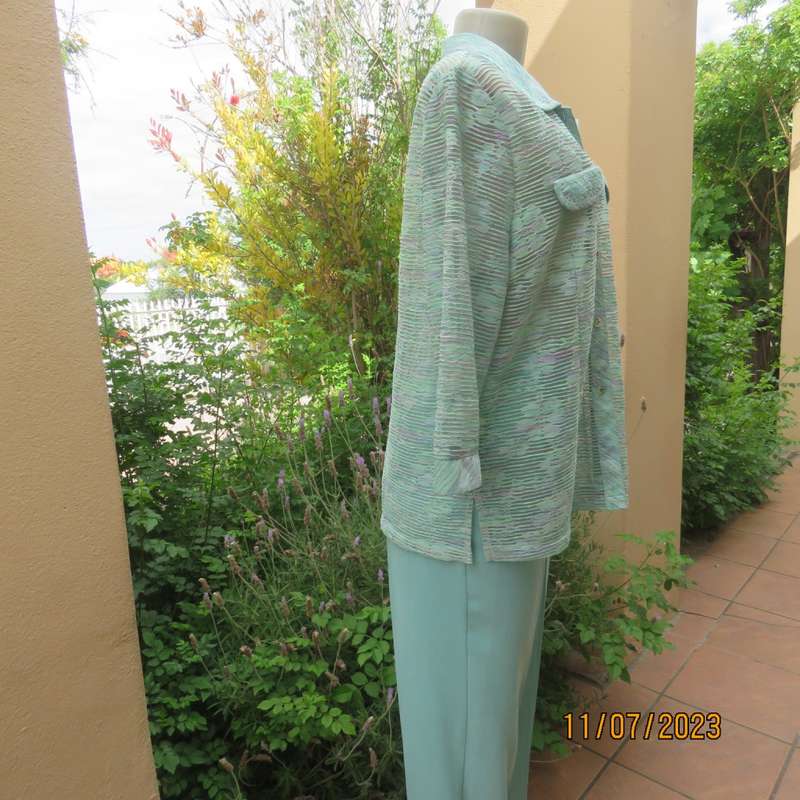 Amazing Agora fashion see-through jacket with embossed light turquois/ lilac pattern.Size 36/12.New