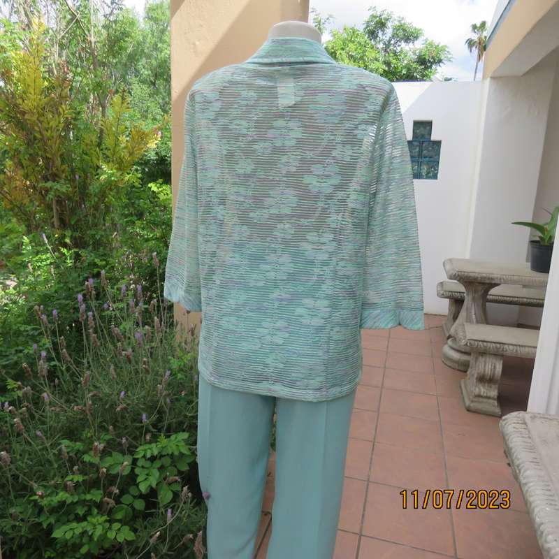 Amazing Agora fashion see-through jacket with embossed light turquois/ lilac pattern.Size 36/12.New