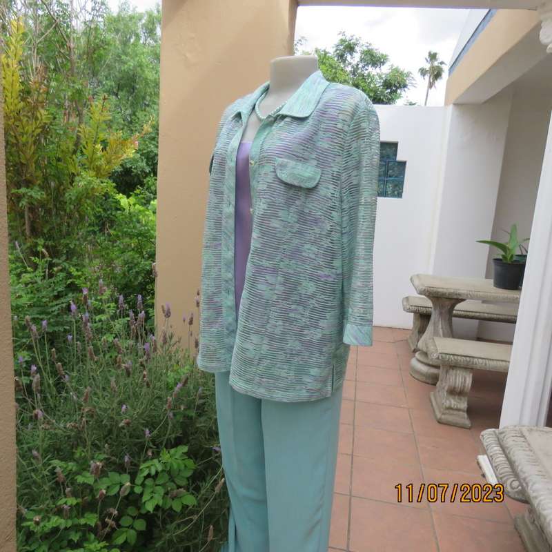 Amazing Agora fashion see-through jacket with embossed light turquois/ lilac pattern.Size 36/12.New