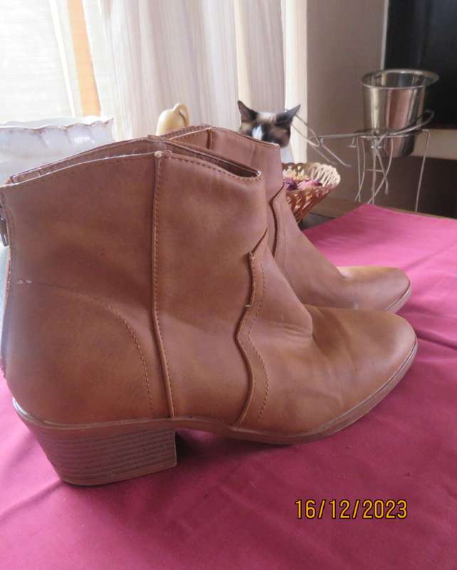 Pair of tan colour ankle boots size 6 by MRP. With comfy cuban heels. Zips at back. New condition
